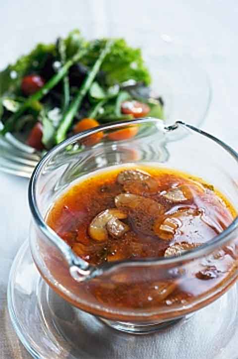 Money's Warm Dressing on Crisp Greens